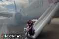 Video shows passengers evacuating